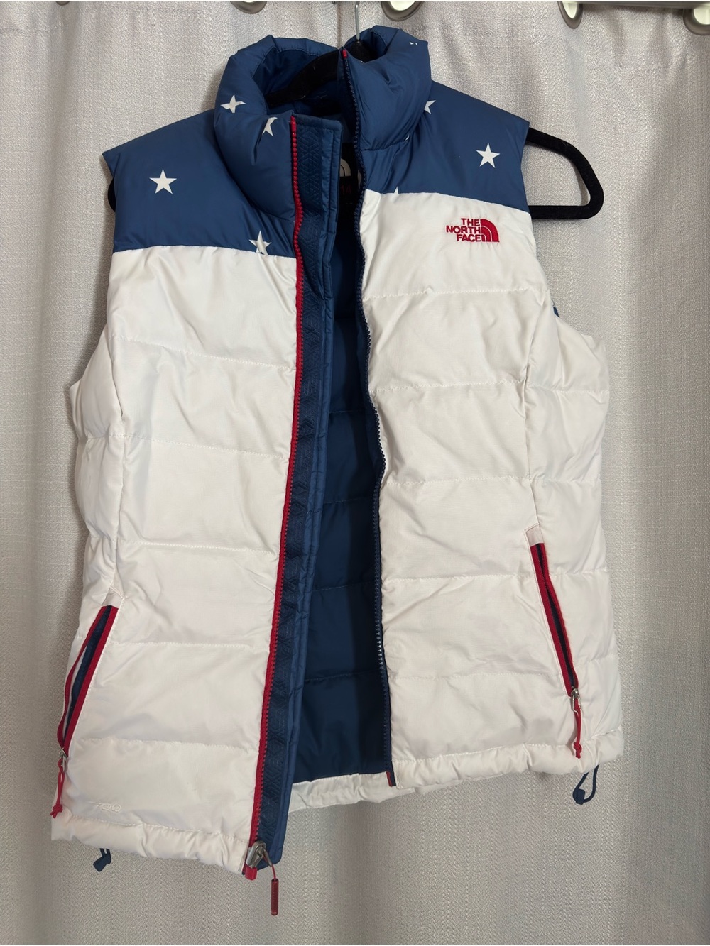 The North Face White, Navy & Red Star Puffer Vest